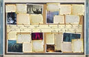 Display case with various colored swatches on a wooden board